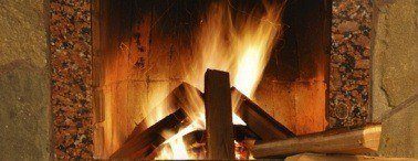 Wood Burning Fireplace or Wood Stove vs. Contemporary Fireplace Options