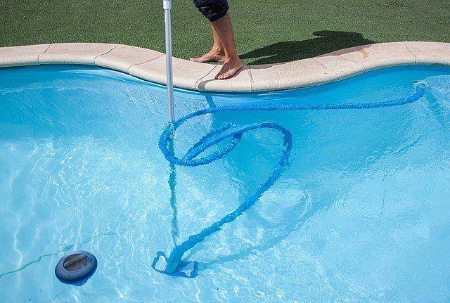 cleaning swimming pool