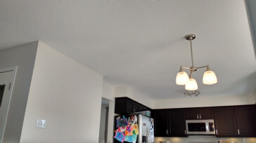 Moving light fixture and repairing California ceiling