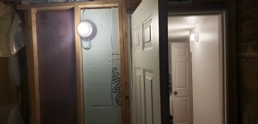 Applying Vapor barrier to wall shared with Cold room