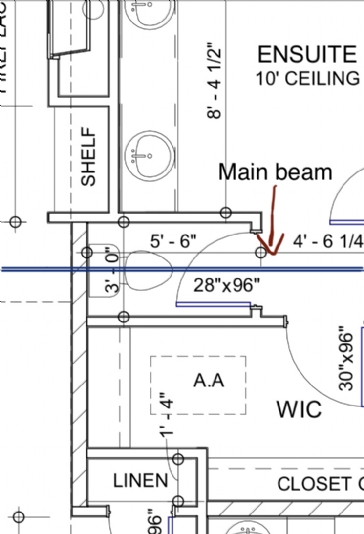 Toilet drain above main support beam