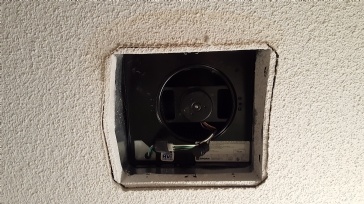 Water damage around bathroom vent fan drywall