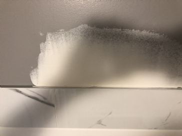 Fix for damaged drywall Were the shower tile meets the drywall. 