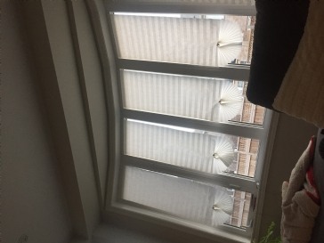 What window treatment could go on this awkward window?