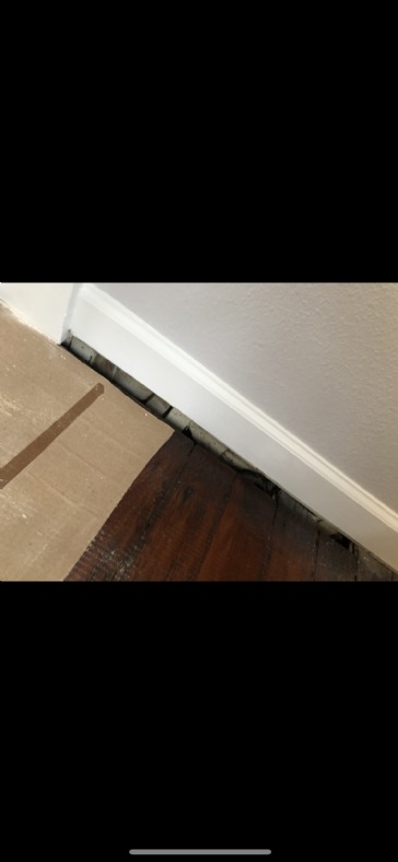 How should I fix or fill the huge space between wall and floor?