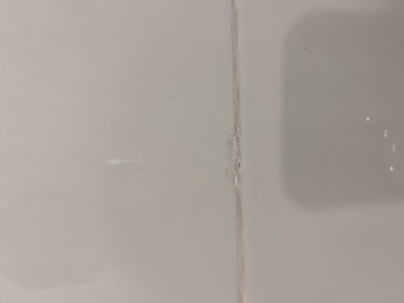 Is it normal for newly installed tiles to be chipped after installation?