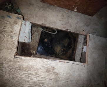 Water with sewage smell in the basement of a small apartment building