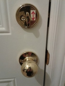 Lock with a key that is operated from the inside of the house