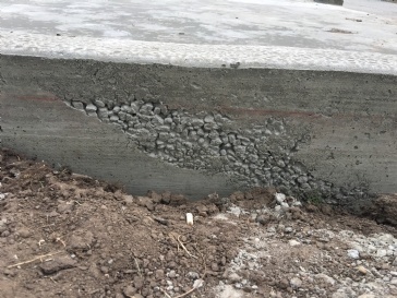 Honeycombing on concrete slab