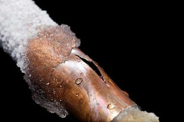 Why do pipes burst on freezing?