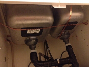 What is the best way to repair a detached under mount sink?