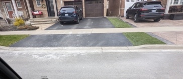 Neighbour's Concrete Contractor made a mess of the street staining multiple driveways