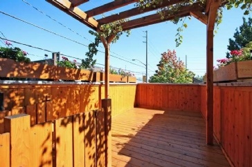Advice for converting above-garage deck into bedroom?
