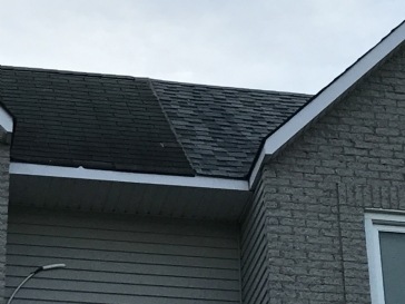 What is my recourse when neighbor of semi detached home encroached on my roof?