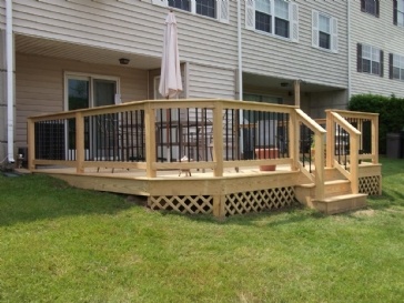 Interested in getting a freestanding deck built, approx. 14 x 18 with wood/black metal railing and two steps down to ground level with railing. Curious, a ballpark price?