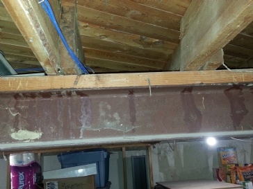 How do I build a partition wall underneath an I-beam?  