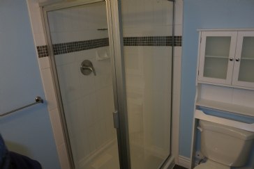 What to do when there is too much moisture behind shower tiles?