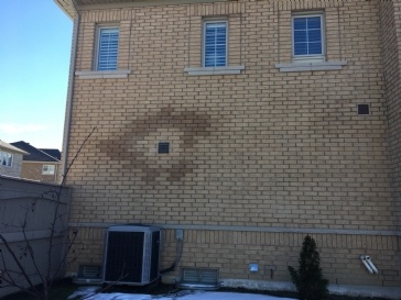 Watermark on exterior wall. What could be the cause?