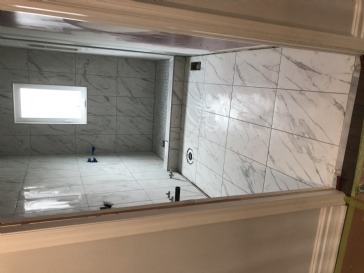 What is roughly cost per sq ft grout and tile installation?