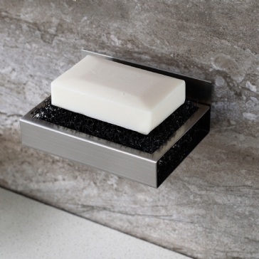 Glue a stainless steel soap holder onto ceramic tiles