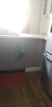 I am desperate to find out how I can hide this ugly bulkhead in my kitchen?  