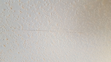 Bulging drywall ceiling corner