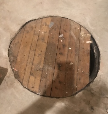 Round Hole in my basement floor