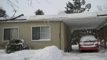 Ice in eavestroughs and downspouts