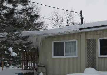 Ice in eavestroughs and downspouts