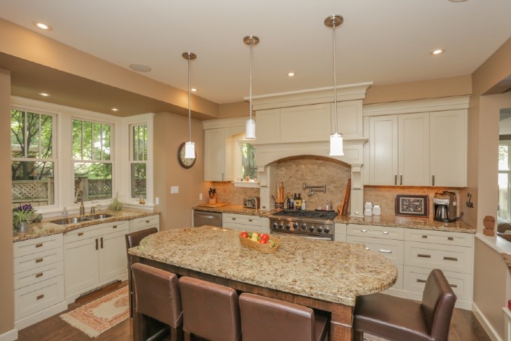 kitchen with white cabinets and huge island