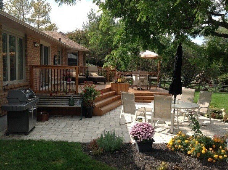 Cedar deck and interlocking stone patio