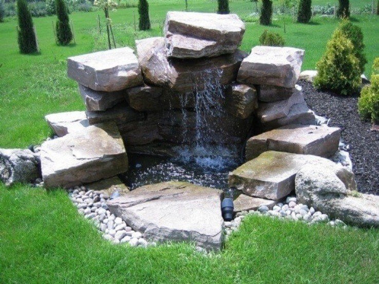 Custom armour rock water feature